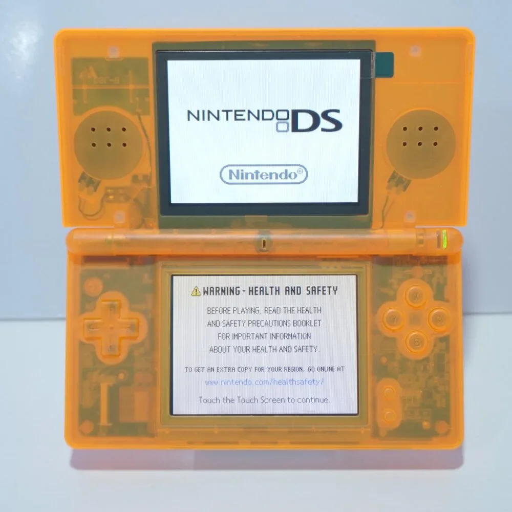 Nintendo DS Lite Transparent Clear Orange Handheld System with Charger & Stylus